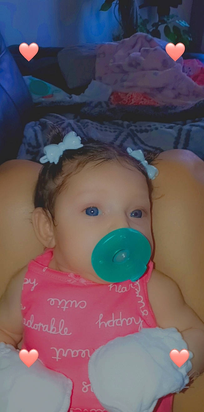 Catalina joined the competition — help win amazing prizes! baby, baby_products, baby_toddler_clothing, blue, cheek, chest, child, eye, finger, fun, happy, iris, nose, person, pink, sitting, skin, toddler, toy, trunk