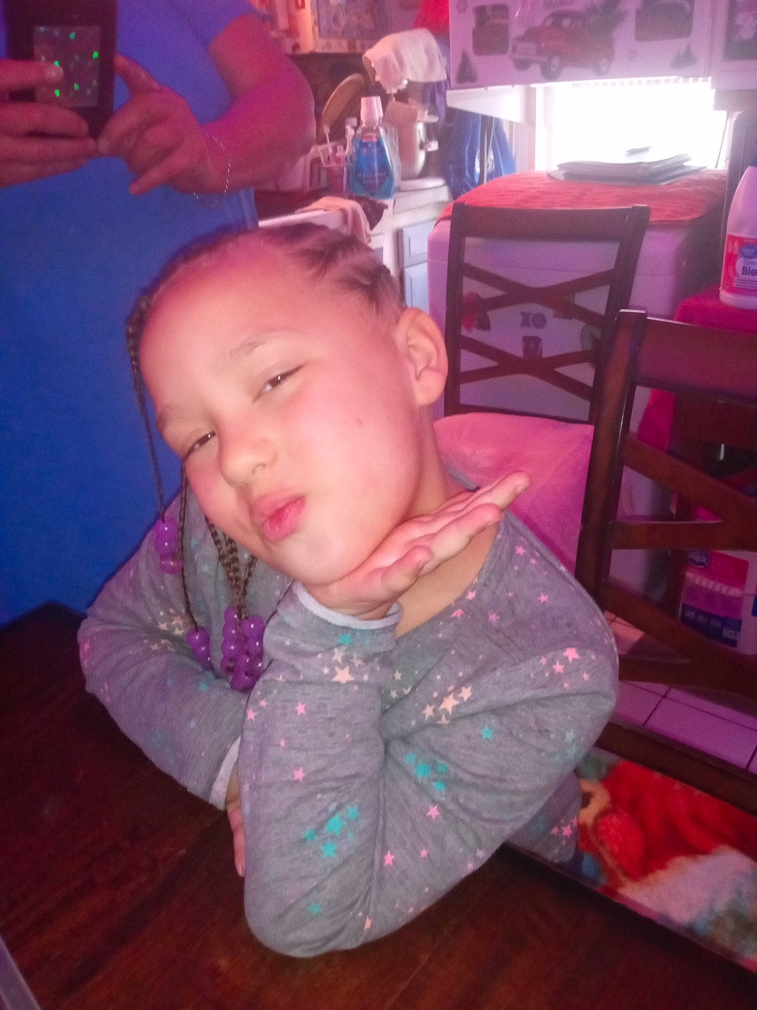 Chloe joined the competition — help win amazing prizes! camera, chair, cheek, child, ear, eyebrow, flooring, fun, happy, hardwood, headwear, magenta, mouth, nose, person, purple, room, single_lens_reflex_camera, sitting, t_shirt