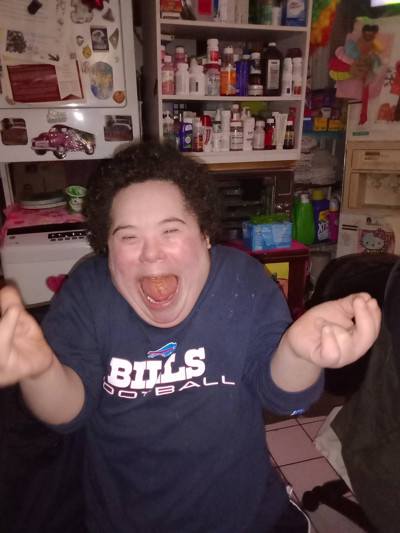 Jj Roberson joined the competition — help win amazing prizes! arm, cheek, chest, cool, facial_hair, finger, fun, gesture, hairstyle, happy, jaw, mouth, person, shelf, shelving, sleeve, smile, t_shirt, thumb, tooth