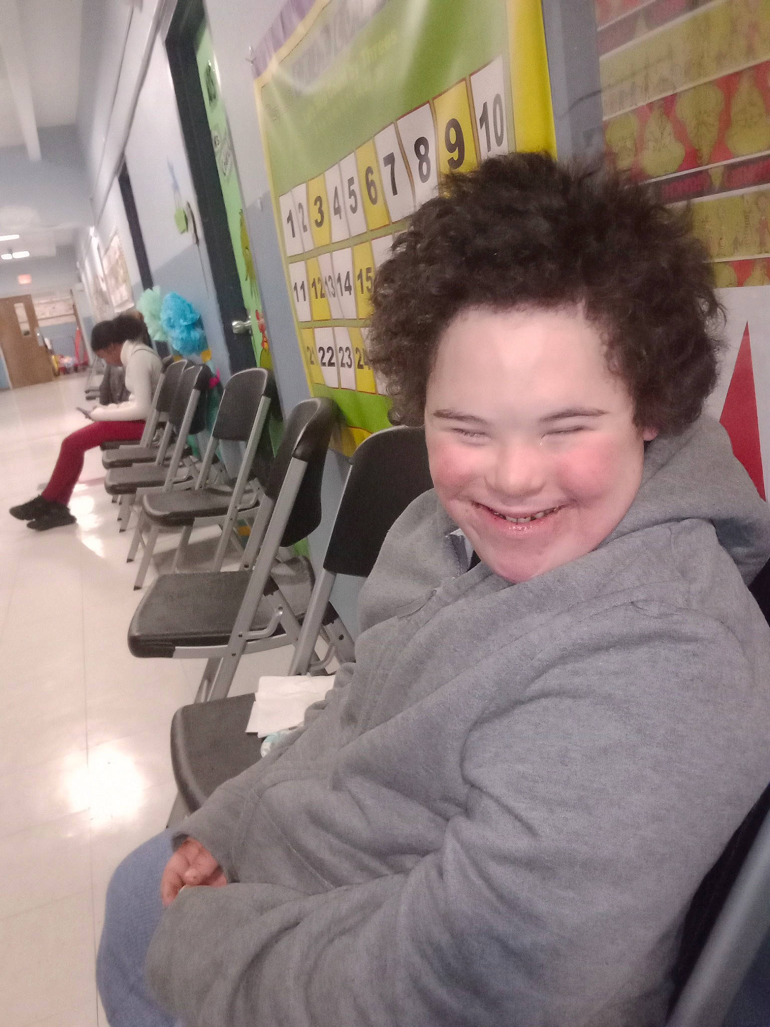 Jj Roberson joined the competition — help win amazing prizes! chair, child, employment, fun, hairstyle, happy, hoodie, job, joy, laugh, leisure, machine, passenger, person, recreation, room, sitting, smile, t_shirt