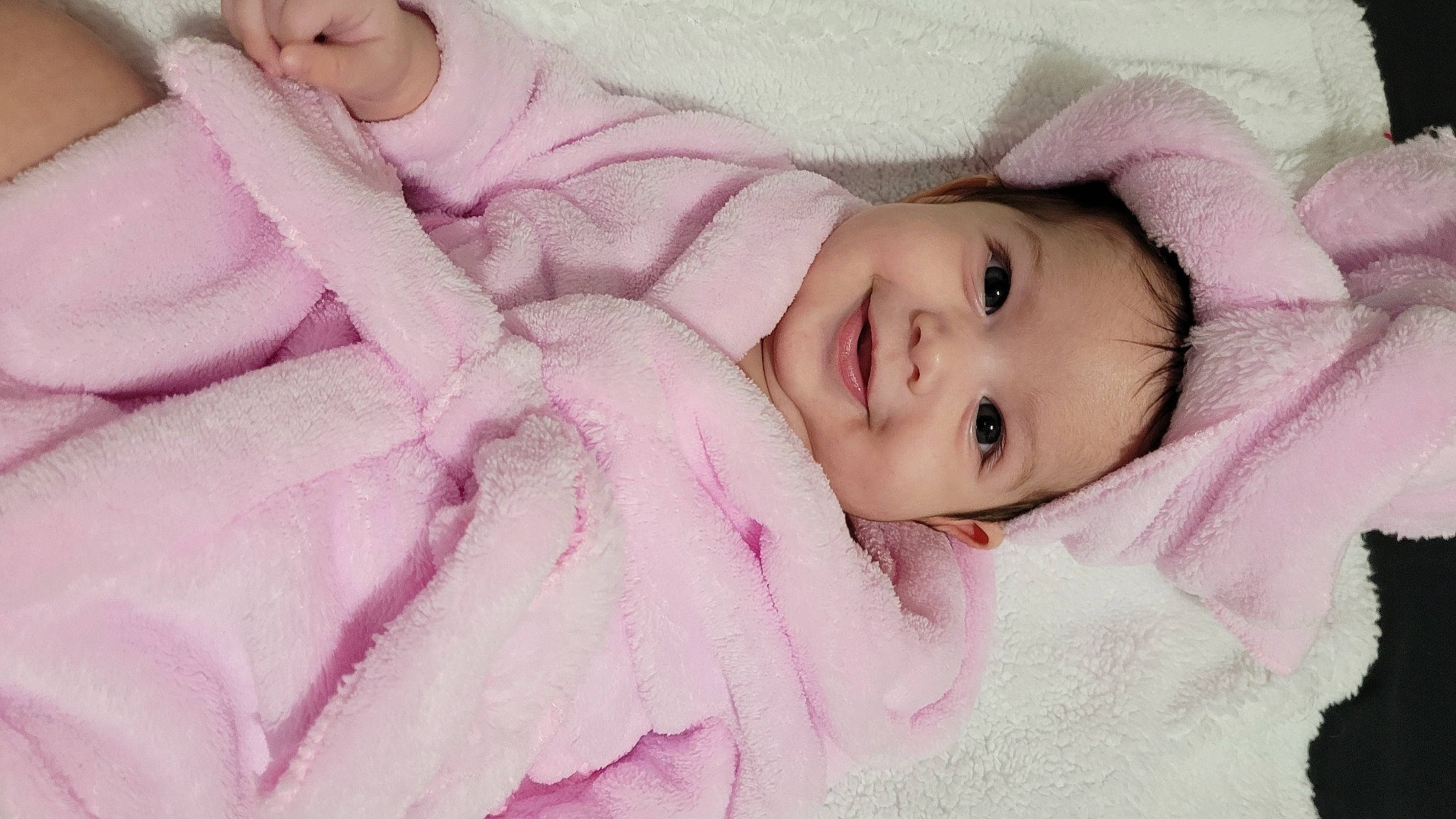 Angelina is registered to the contest to win money with this photo: cheek, chin, comfort, eyebrow, eyelash, happy, head, headwear, iris, joy, linens, lip, magenta, nose, outerwear, person, pink, skin, sleeve, smile