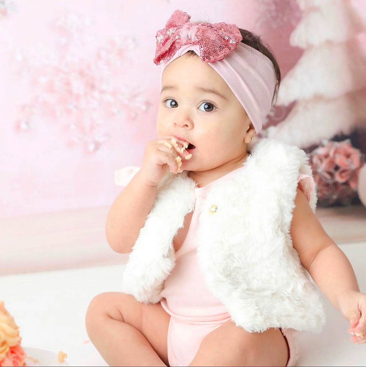 Scarlett is registered to the contest to win money with this photo: baby, baby_toddler_clothing, cap, child, costume_hat, embellishment, flash_photography, fur, hair_accessory, happy, headband, headgear, headpiece, headwear, jewellery, lip, person, petal, pink, skin