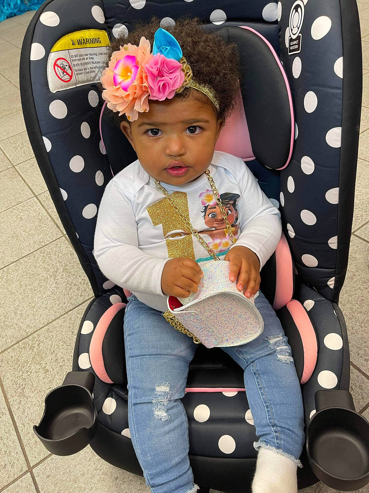 Janiylah is registered to the contest to win money with this photo: baby_products, baby_toddler_clothing, bag, blue, child, costume_hat, fashion_accessory, fun, happy, headband, headpiece, headwear, pattern, person, pink, shoe, sleeve, sneakers, sock, thigh