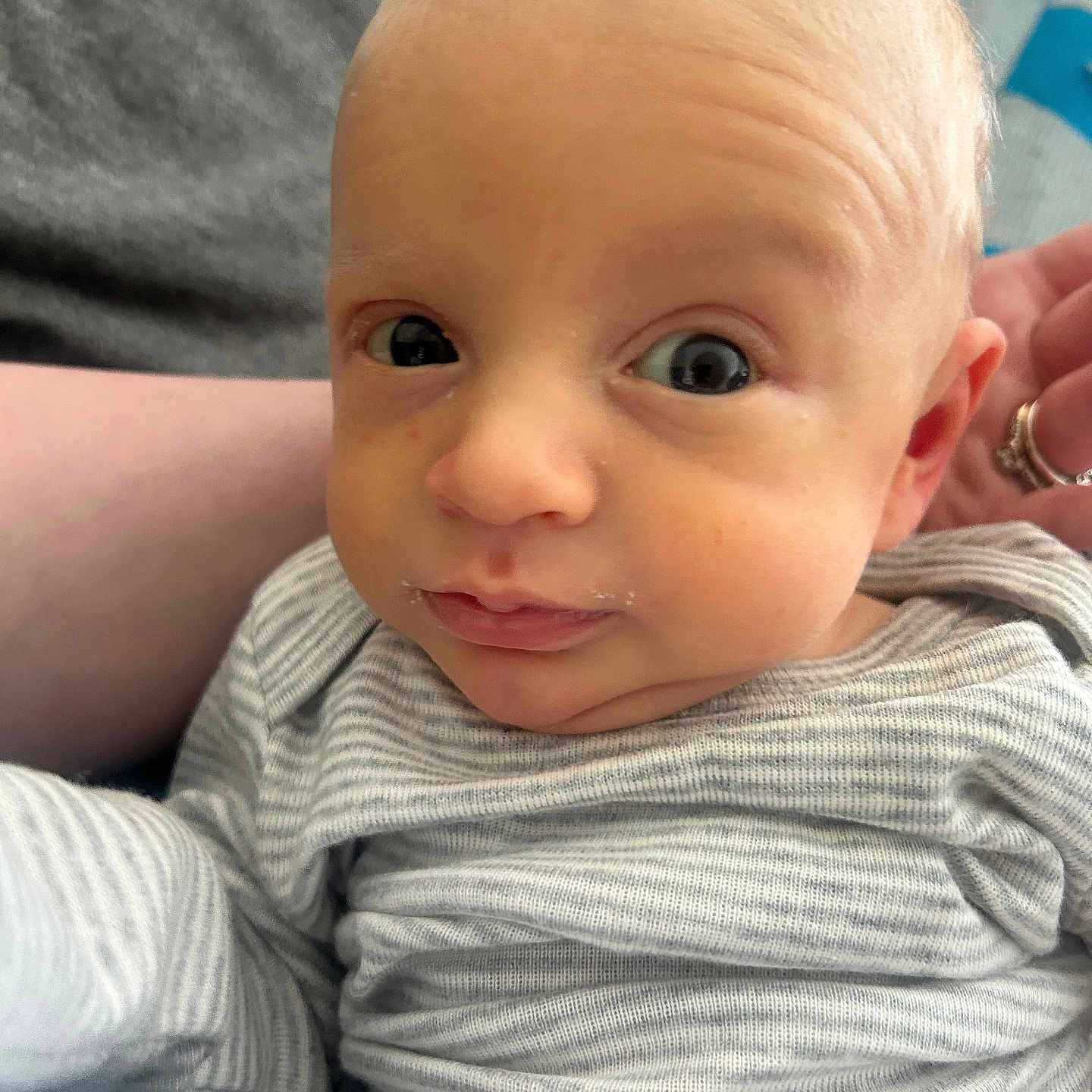 Lucas joined the competition — help win amazing prizes! baby, child, clothing, cute, expression, eyes, face, hand, head, holding, human, indoor, infant, newborn, person, portrait, skin, soft_light, striped, young