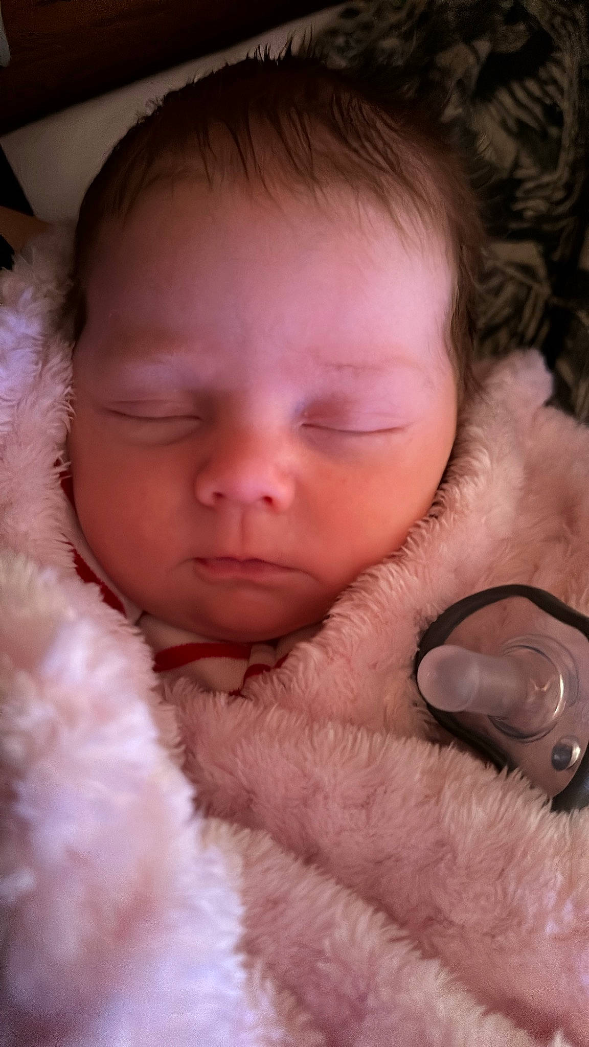 Paisley is registered to the contest to win money with this photo: baby, cheek, child, chin, close_up, comfort, eyebrow, eyelash, finger, fur, gesture, happy, lip, mammal, mouth, nose, person, pink, skin, thumb