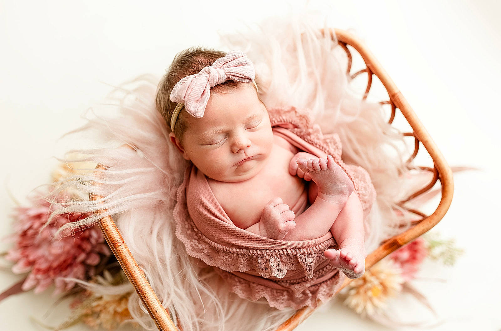 Paisley is registered to the contest to win money with this photo: baby, baby_products, baby_sleeping, baby_toddler_clothing, comfort, event, fashion_accessory, fur, hair_accessory, happy, headband, headpiece, jewellery, magenta, peach, person, petal, portrait_photography, sitting, sweetness