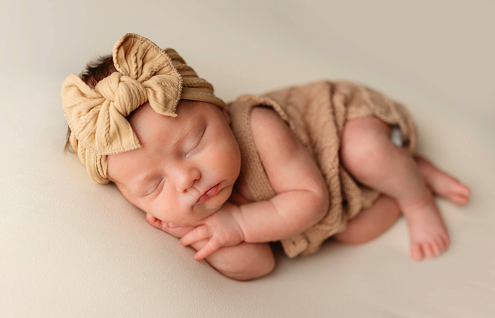 Paisley joined the competition — help win amazing prizes! baby, baby_sleeping, baby_toddler_clothing, child, comfort, eyelash, fashion_accessory, foot, headband, headpiece, headwear, linens, nail, person, portrait_photography, sitting, skin, sleeve, thumb, toddler