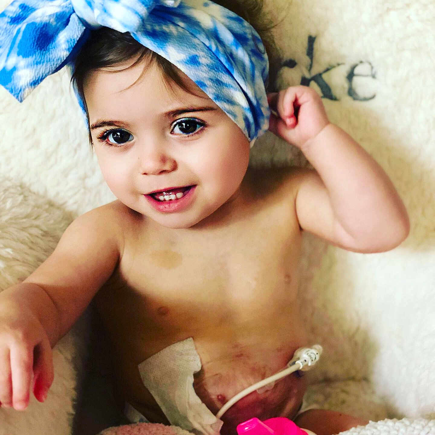 Clarke is registered to the contest to win money with this photo: baby, baby_bloomers, child, child_model, costume, costume_accessory, ear, fashion_accessory, hair_accessory, happy, headband, headgear, headpiece, person, skin, smile, toddler