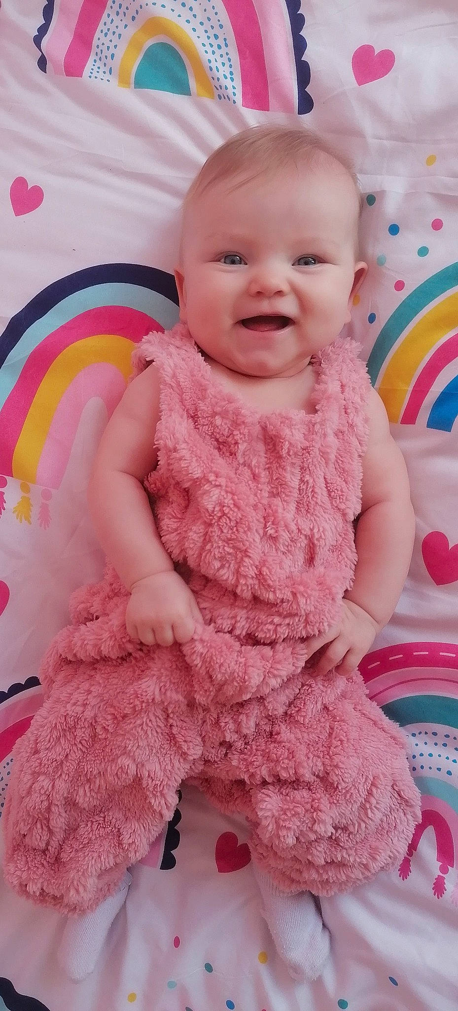 Karma-may is registered to the contest to win money with this photo: baby, baby_products, baby_toddler_clothing, cheek, child, circle, fun, happy, magenta, pattern, peach, person, pink, play, sitting, skin, sleeve, smile, textile, toddler