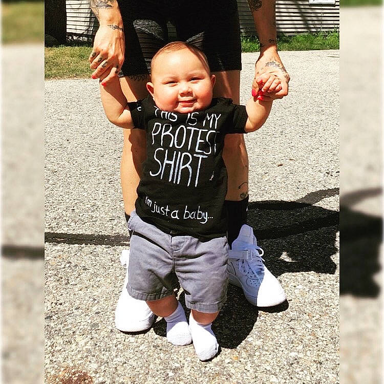 Lucciano is registered to the contest to win money with this photo: arm, child, cool, facial_expression, footwear, gesture, hand, happy, iron, jeans, joy, muscle, people, person, play, product, public_space, shoe, smile, swing