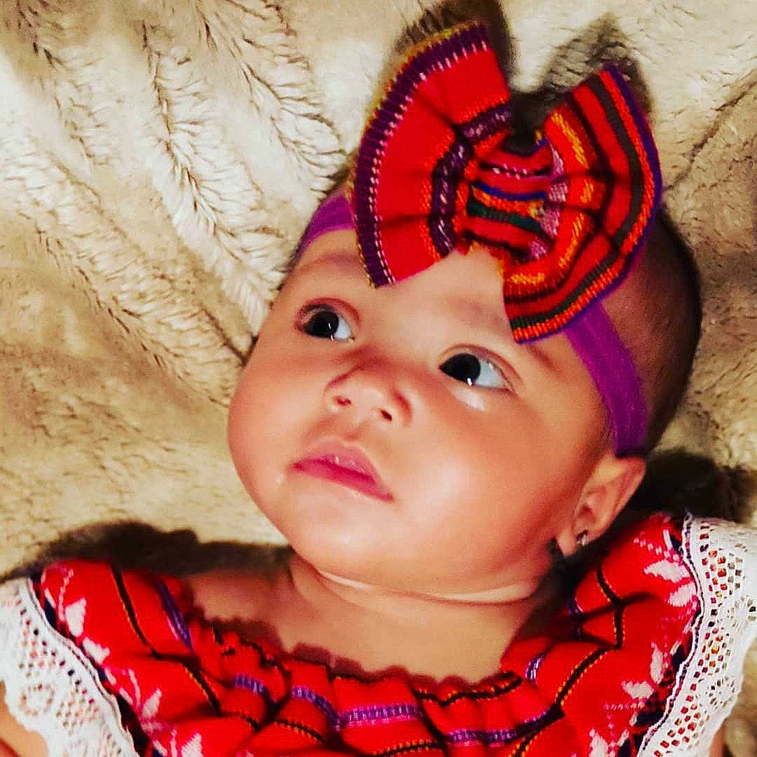 Aliyana is registered to the contest to win money with this photo: baby, cheek, child, close_up, cool, costume_accessory, ear, eye, face, fashion_accessory, forehead, hair_accessory, head, headgear, headpiece, lip, nose, organ, person, photography