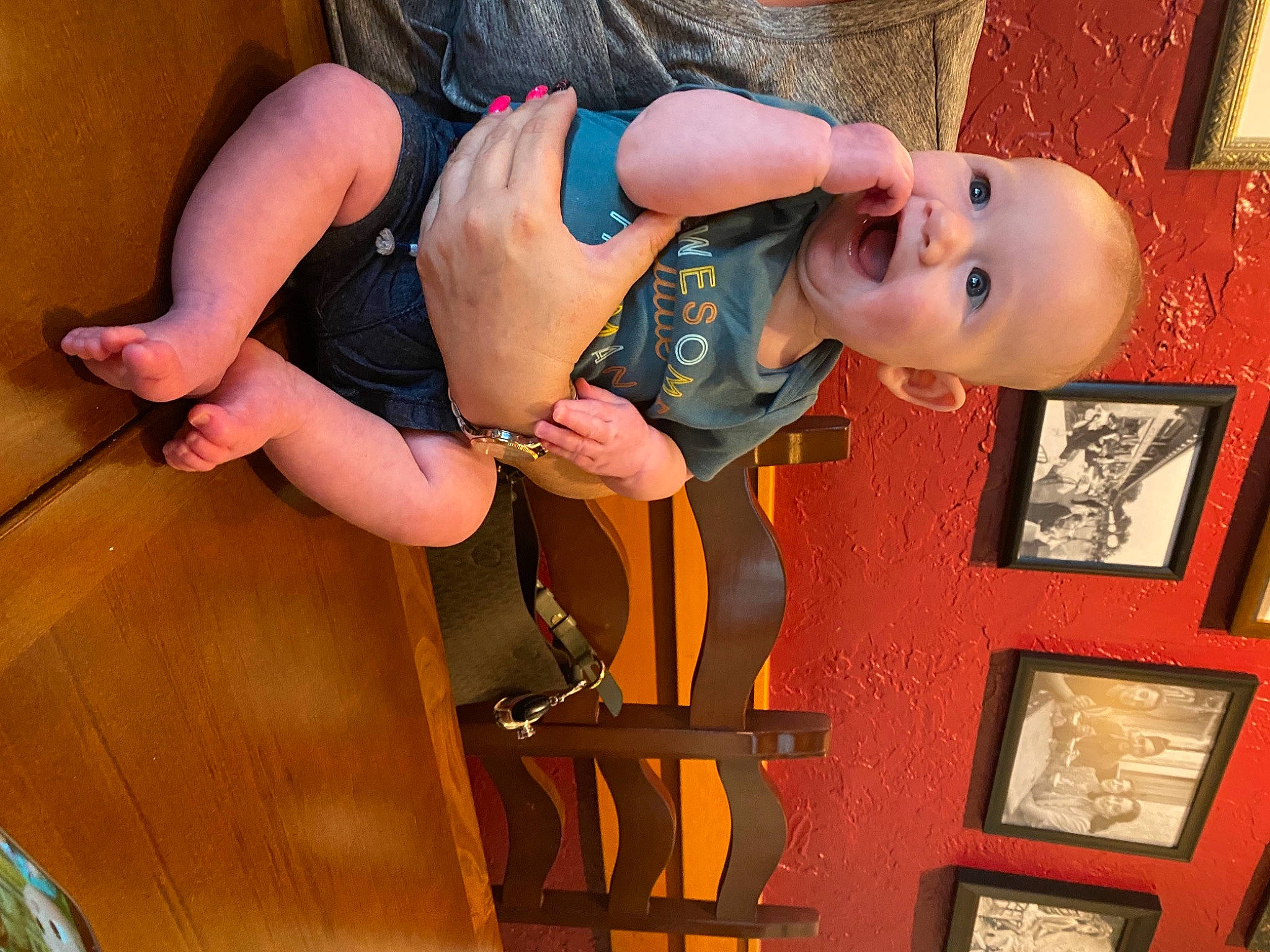 Tanner James is registered to the contest to win money with this photo: arm, baby, blurred, chest, elbow, foot, fun, human_body, human_leg, joint, knee, leg, muscle, person, picture_frame, room, smile, thigh, toddler, trunk