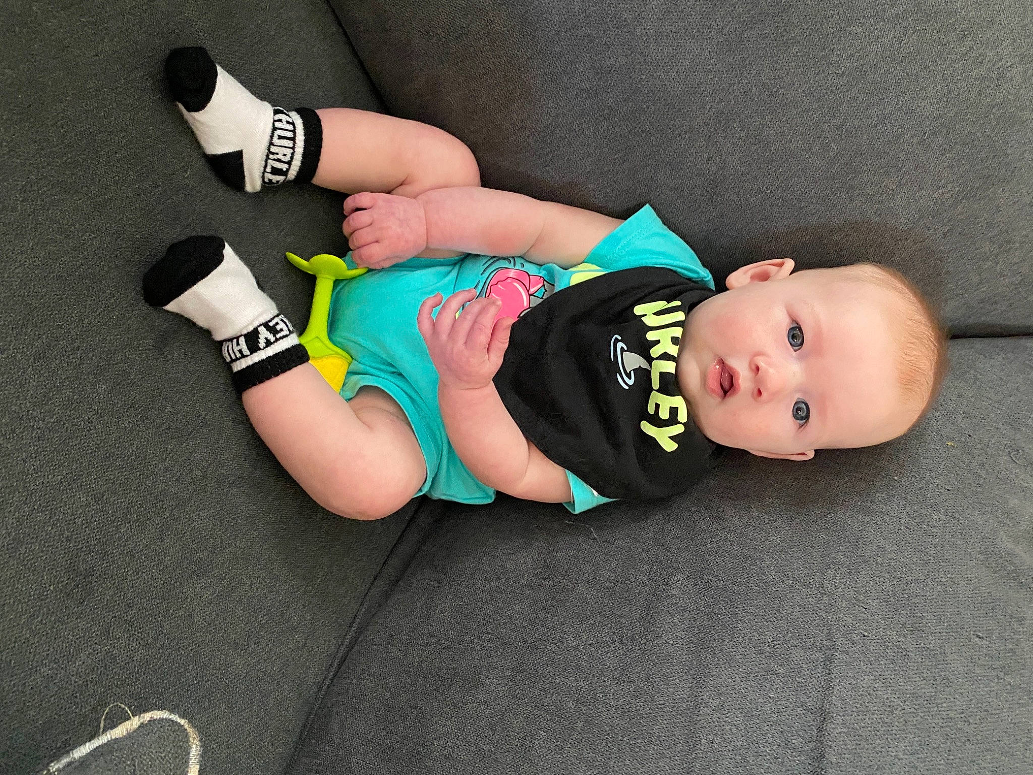 Tanner James joined the competition — help win amazing prizes! baby, baby_toddler_clothing, comfort, elbow, finger, foot, hand, human_body, knee, lap, leg, person, shorts, sock, sportswear, sunglasses, thigh, trunk, undergarment, waist