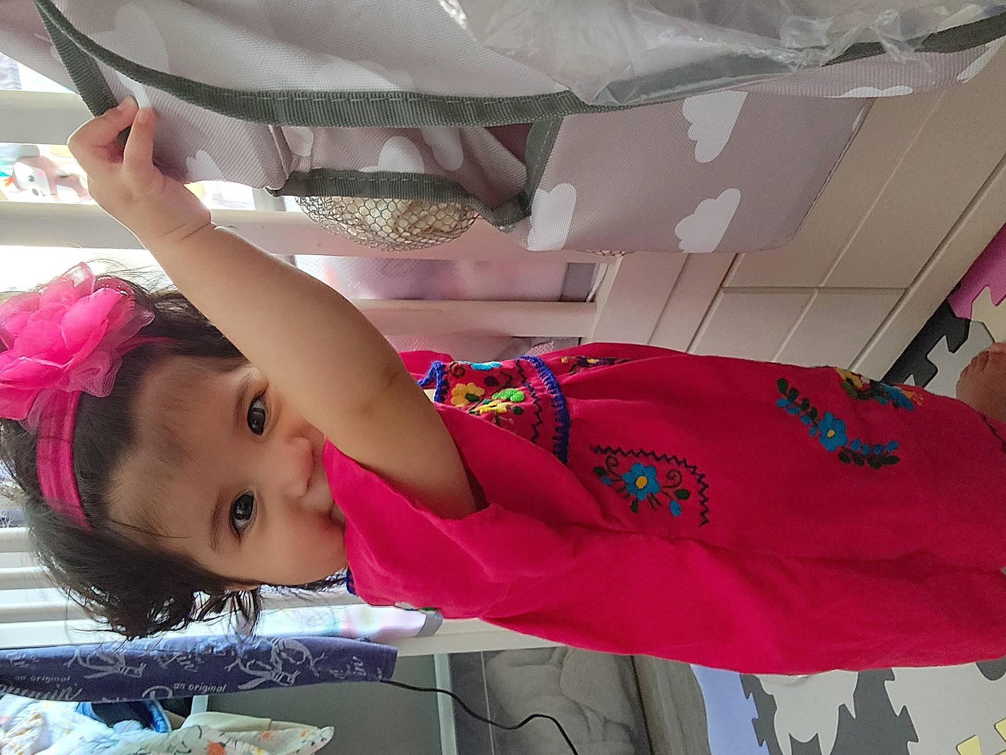 Leah joined the competition — help win amazing prizes! clothing, dress, fashion_accessory, happy, human_leg, magenta, person, pink, plant, red, room, textile, thigh, toddler, white