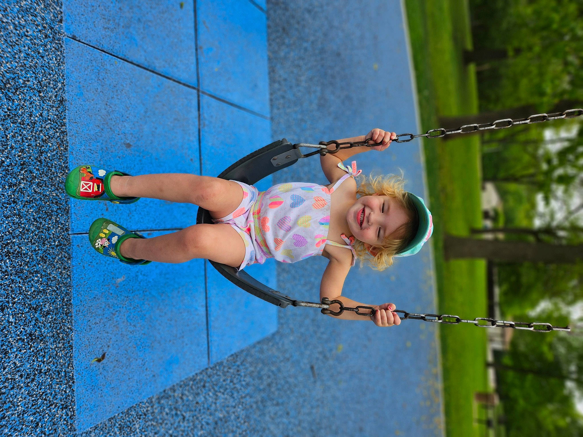 Sky is registered to the contest to win money with this photo: adventure, blue, child, elbow, electric_blue, fun, happy, human_leg, joy, knee, leisure, person, recreation, rope, shorts, smile, sport_climbing, t_shirt, thigh, toddler