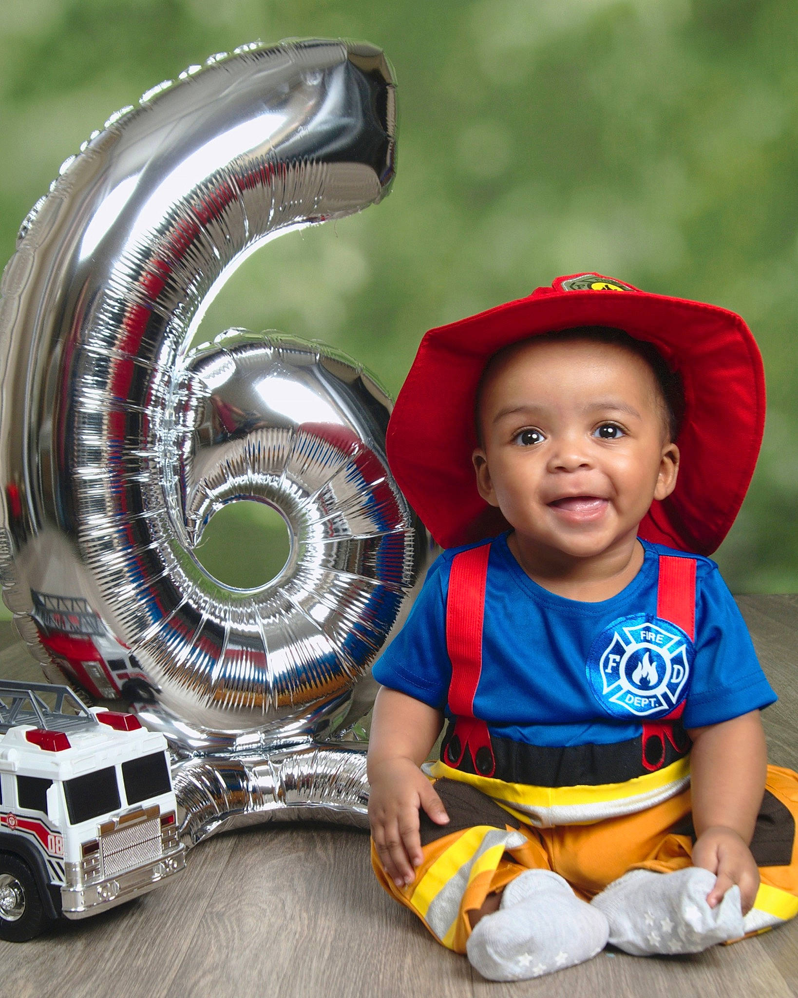 Marvin is registered to the contest to win money with this photo: automotive_design, automotive_tire, automotive_wheel_system, baby, baby_toddler_clothing, bumper, event, fun, happy, hat, headgear, joy, leisure, motor_vehicle, person, sun_hat, tire, toddler, toy, travel