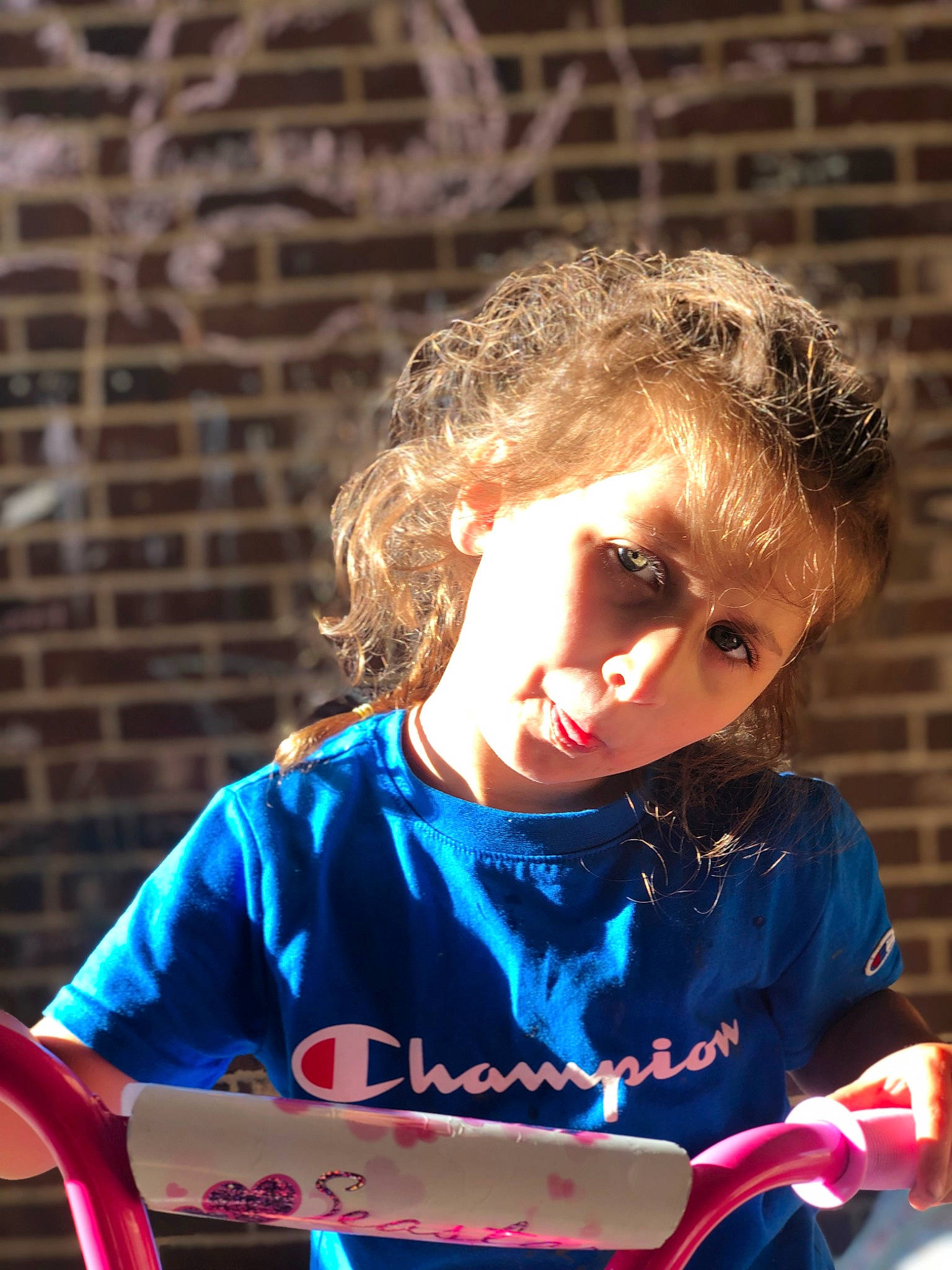 Kameron is registered to the contest to win money with this photo: child, electric_blue, entertainment, eyewear, folk_instrument, fun, glass, idiophone, music, musical_instrument, musical_instrument_accessory, musician, person, play, plucked_string_instruments, portrait_photography, reading, sitting, t_shirt, toddler