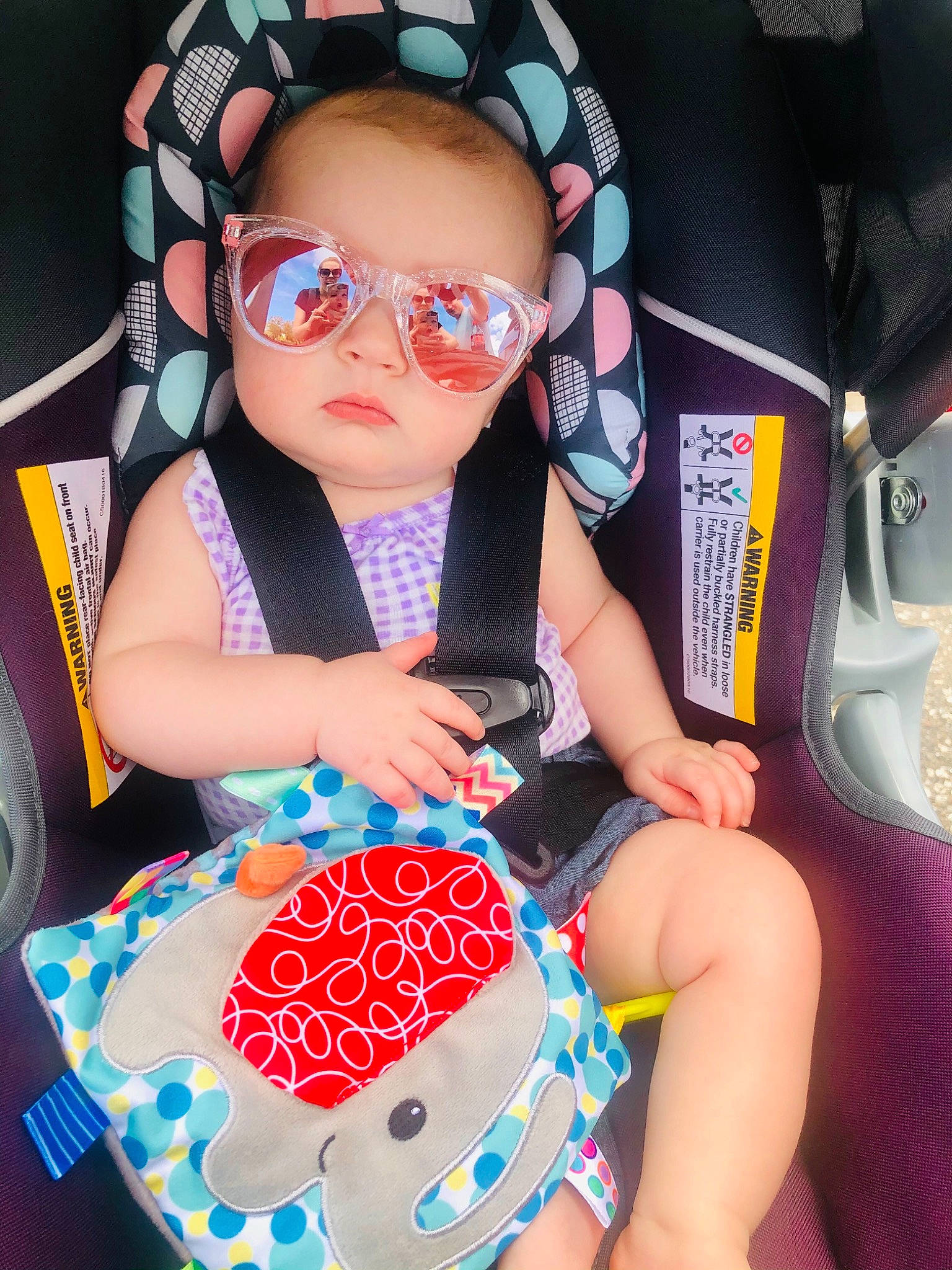 Parker is registered to the contest to win money with this photo: arm, baby_toddler_clothing, cool, electric_blue, eyewear, finger, fun, glasses, goggles, hairstyle, hand, headgear, nail, person, pink, sunglasses, thigh, toddler, vision_care, white