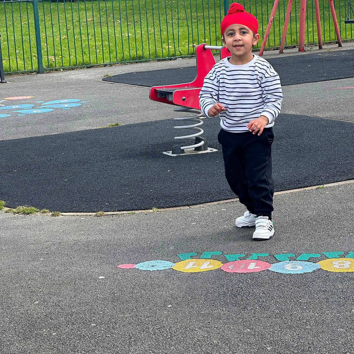 Jaideep Singh is registered to the contest to win money with this photo: boy, child, clothing, face, footwear, grass, hat, head, male, nature, outdoorplayarea, outdoors, pants, park, person, photography, plant, playarea, portrait, walking