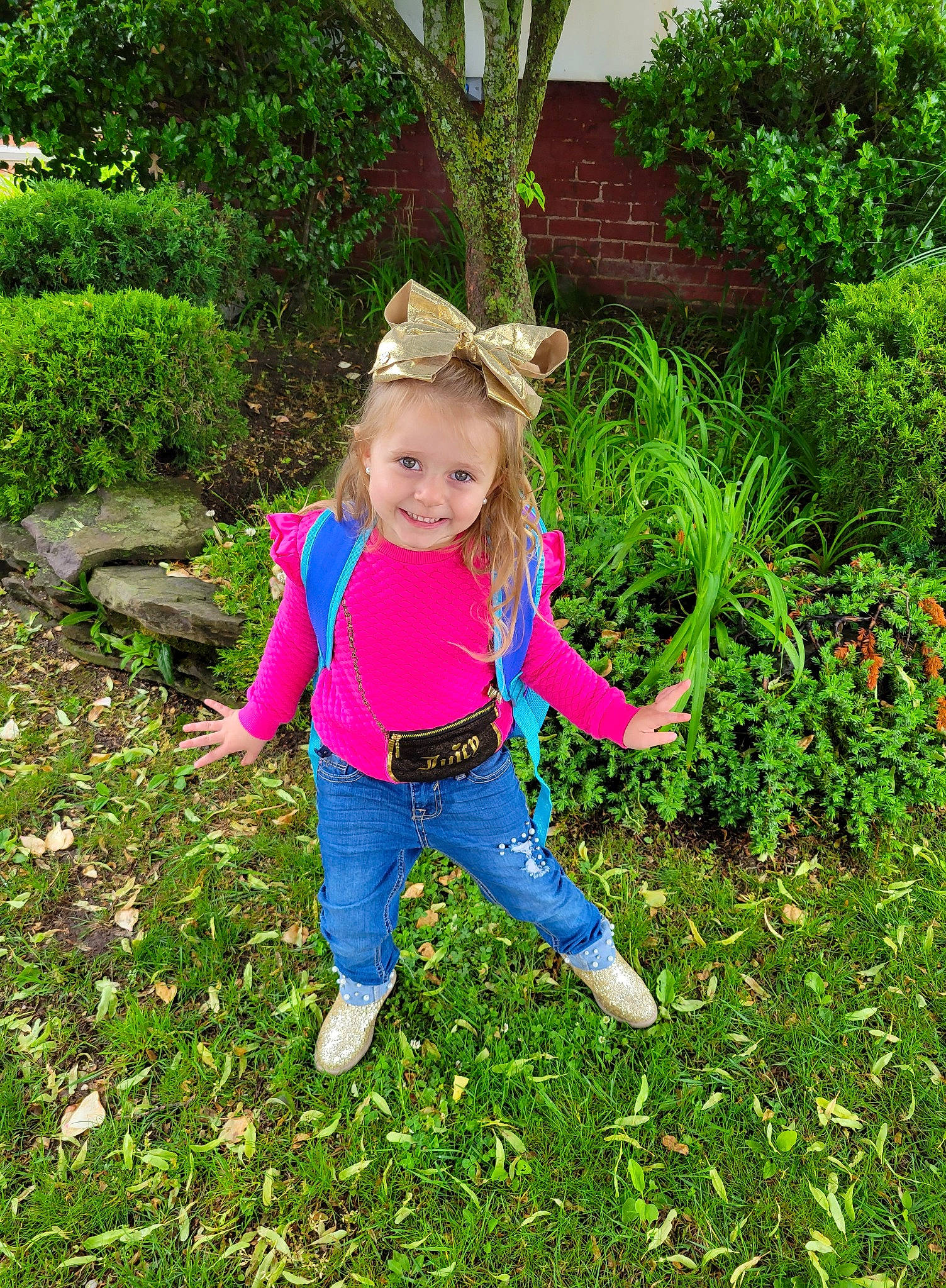 Gianna is registered to the contest to win money with this photo: baby_toddler_clothing, electric_blue, flower, fun, grass, grassland, groundcover, happy, joy, landscape, lawn, magenta, meadow, natural_landscape, people_in_nature, person, plant, shrub, smile, terrestrial_plant