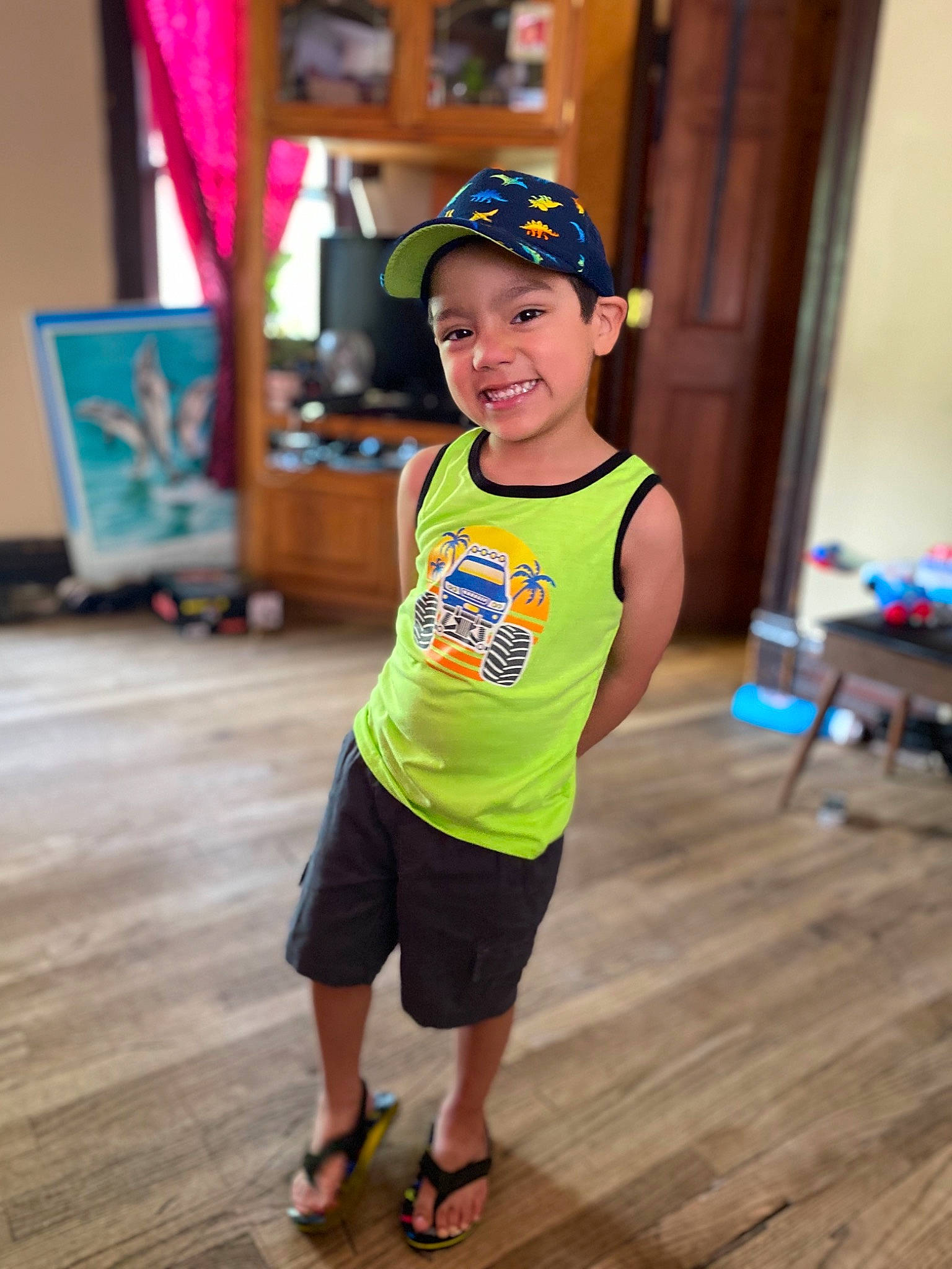 Daniel joined the competition — help win amazing prizes! baseball_cap, cap, electric_blue, face, flooring, fun, happy, hat, headgear, headwear, joy, leisure, person, shorts, shoulder, sleeve, smile, sportswear, standing, street_fashion