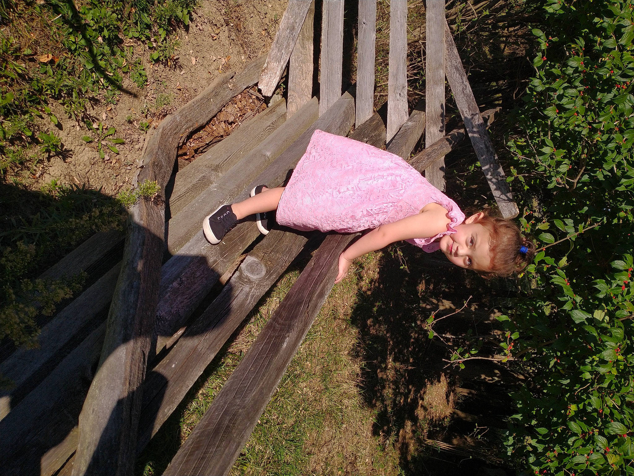 Autumn is registered to the contest to win money with this photo: fun, garden, grass, grass_family, human_leg, landscape, leisure, outdoor_furniture, people_in_nature, person, plant, road_surface, shadow, shrub, soil, thigh, tints_and_shades, tree, trunk, waist