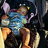 Lani joined the competition — help win amazing prizes! baby, sleeping, car_seat, denim_overalls, bottle, infant, child, sunlight, yellow_shirt, seatbelt, vehicle_interior, cute, peaceful, hand, foot, pink_trim, black_car_seat, soft_toys, relaxation, portrait