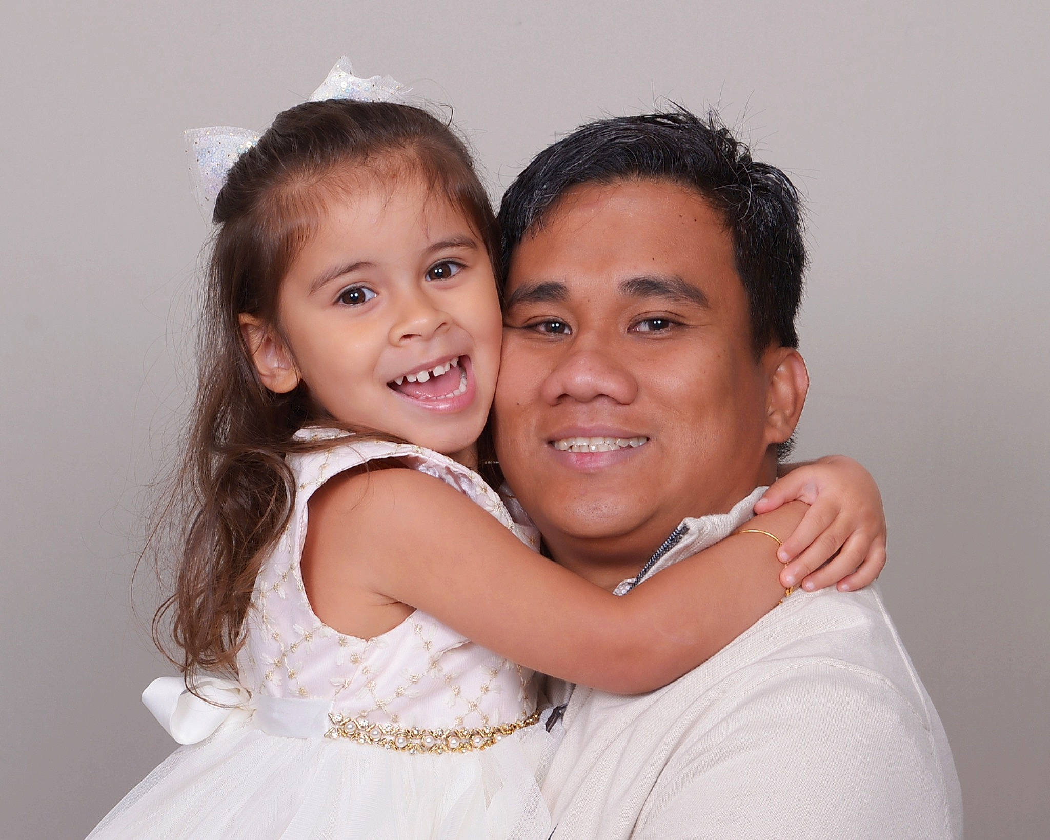 Carson is registered to the contest to win money with this photo: cheek, child, day_dress, event, flash_photography, formal_wear, fun, gesture, happy, hug, iris, joy, laugh, love, person, photo_shoot, portrait_photography, shoulder, skin, sleeve