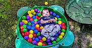 Daniel Moreno is registered to the contest to win money with this photo: backyard, ball_pit, casual_clothing, child, colorful_balls, daylight, fun, grass, green_turtle, happy, nature, outdoor, plastic_balls, play, playtime, relaxing, sunlight, toddler, toy, young_child