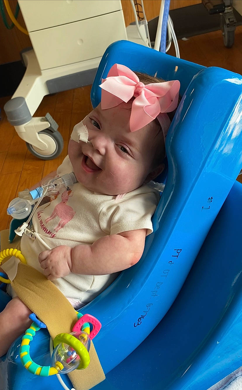 Wrynlee joined the competition — help win amazing prizes! baby, baby_products, baby_safety, baby_toddler_clothing, baby_toys, blue, child, comfort, electric_blue, event, fun, happy, head, headwear, leisure, person, pink, sitting, smile, toddler