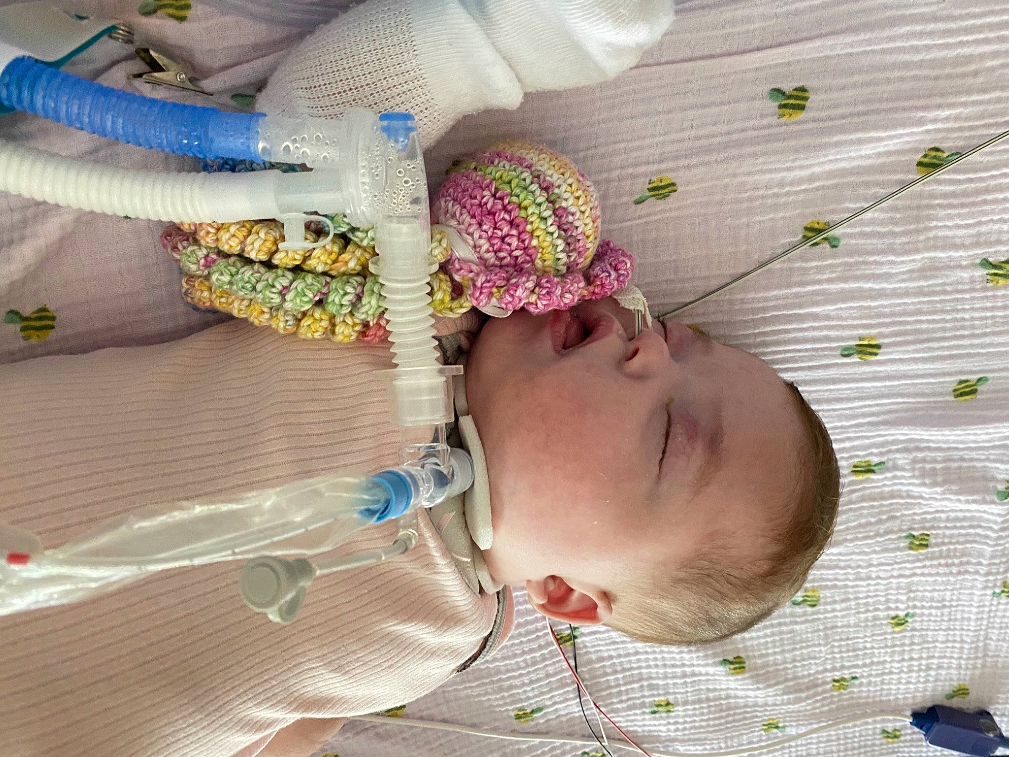 Wrynlee is registered to the contest to win money with this photo: baby, baby_products, baby_safety, baby_toddler_clothing, child, comfort, fashion_accessory, headgear, linens, nap, pattern, person, room, skin, sleep, textile, thread, toddler, white, wool