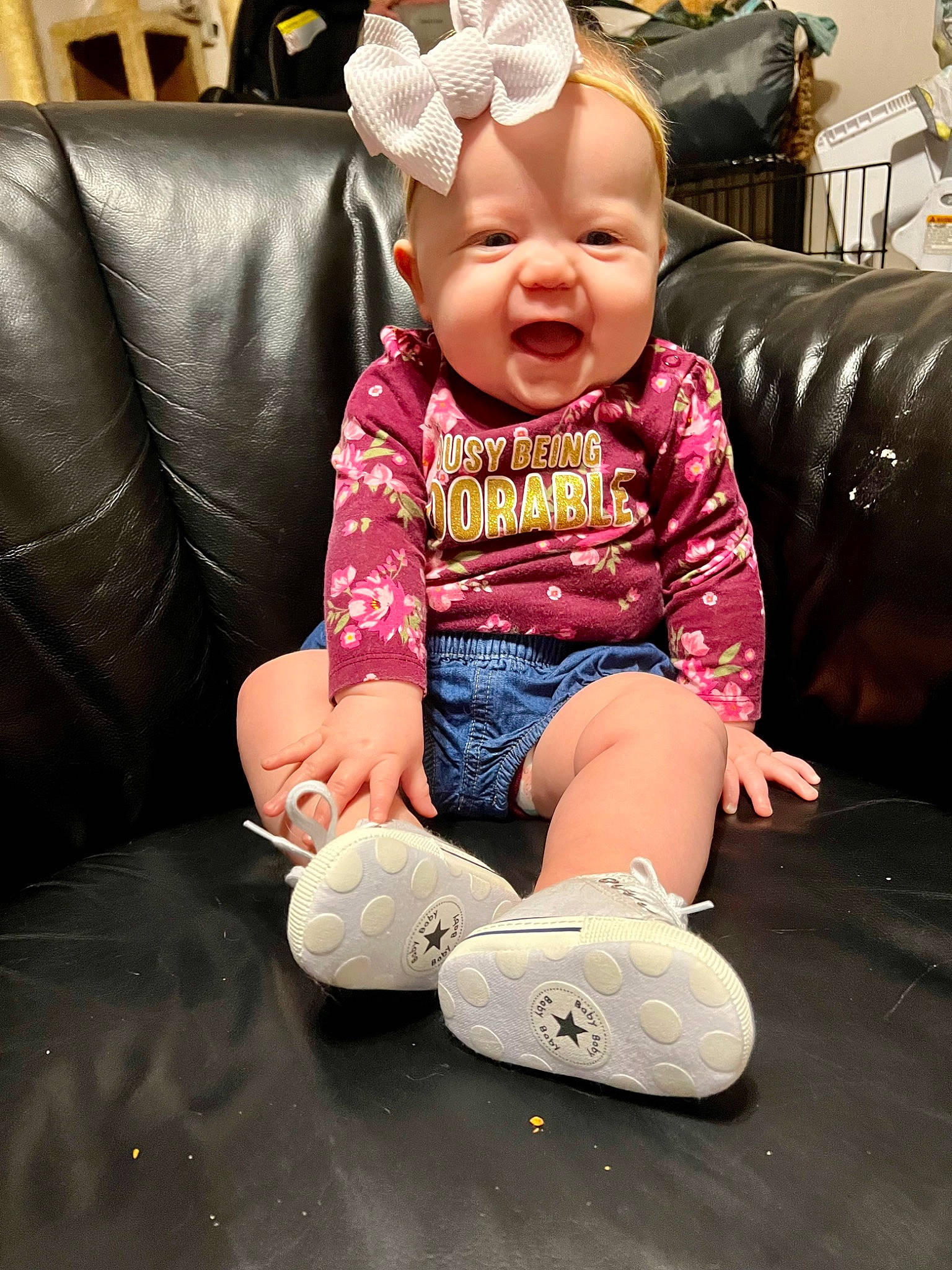Aileen joined the competition — help win amazing prizes! baby, baby_toddler_clothing, cheek, comfort, cool, couch, eye, facial_expression, finger, floor, flooring, fun, happy, human, person, pink, purple, skin, sleeve, smile