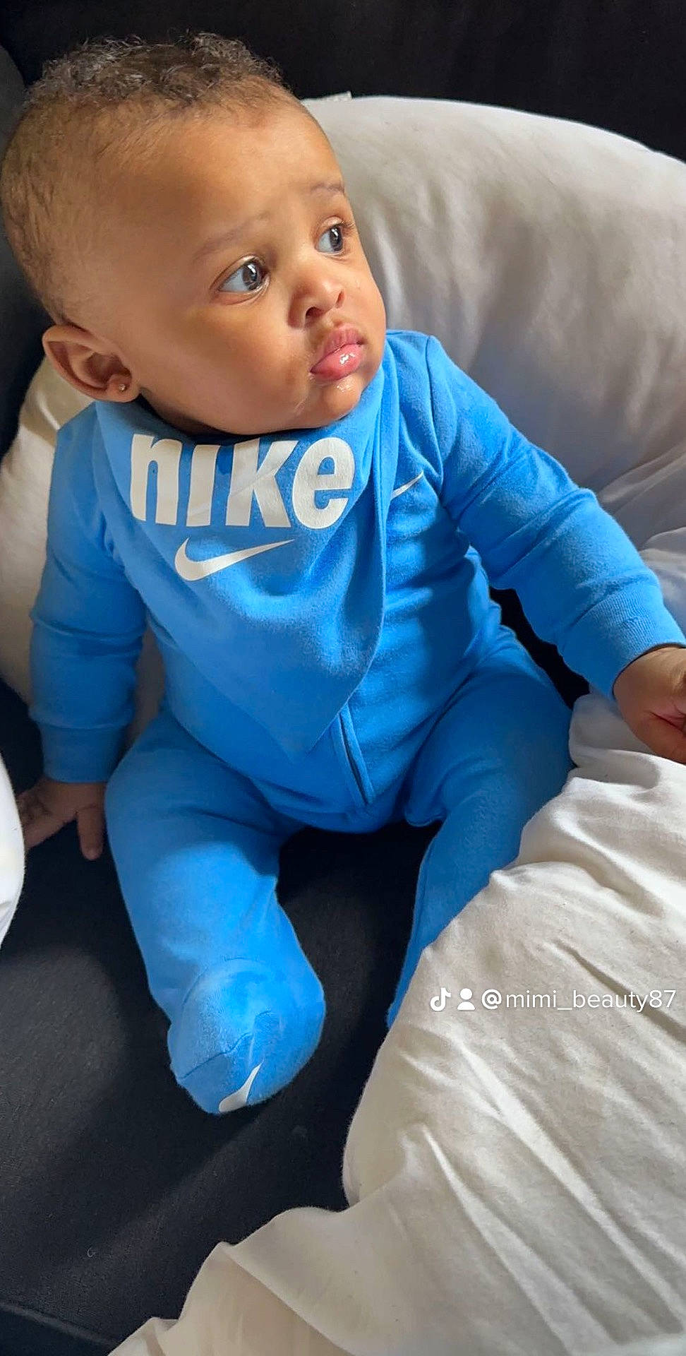 William is registered to the contest to win money with this photo: azure, baby, baby_toddler_clothing, cheek, child, comfort, eye, facial_expression, finger, flash_photography, happy, head, human_body, iris, leg, mouth, nose, person, skin, sleeve