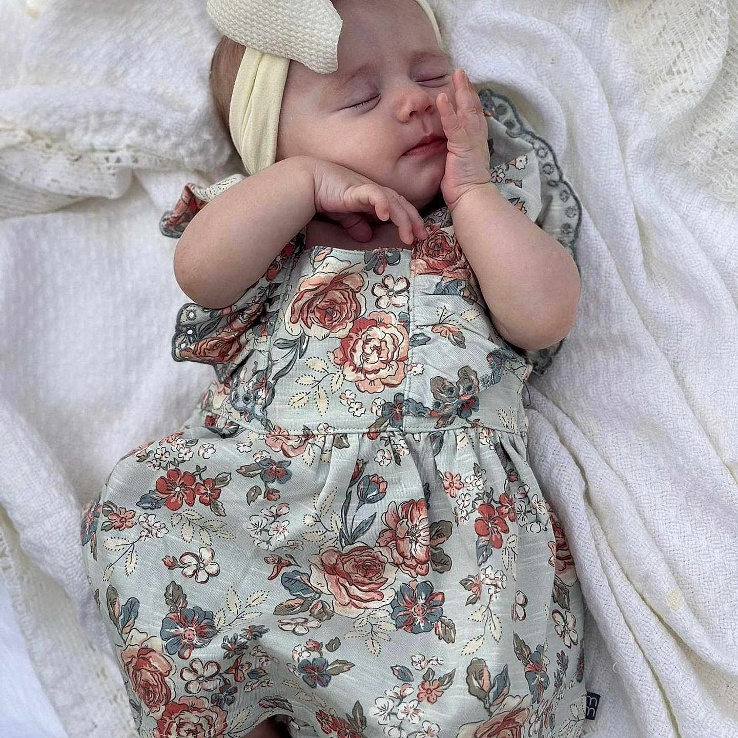 Kennedy is registered to the contest to win money with this photo: baby, bed, blanket, bonnet, cap, clothing, dress, face, furniture, hat, head, newborn, pattern, person, photography, portrait, quilt, sleeping, sleeve, yawning