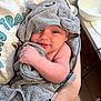 Jeremiah joined the competition — help win amazing prizes! baby, infant, towel, gray, smiling, face, person, arm, hand, indoor, bathroom, hood, cute, child, wrapped, soft, skin, happy, holding, young