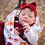 baby, bodypart, bonnet, cap, clothing, face, finger, frown, hand, hat, head, hoodie, knitwear, newborn, person, photography, portrait, sad, sweater, sweatshirt