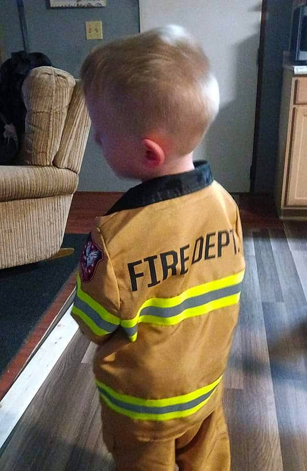 Ryder Henson joined the competition — help win amazing prizes! baby, baby_toddler_clothing, cabinetry, child, emergency_service, floor, flooring, grass, hardwood, head, high_visibility_clothing, home_appliance, kitchen_appliance, person, personal_protective_equipment, room, sleeve, t_shirt, toddler, wood