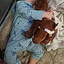 Atalli is registered to the contest to win money with this photo: toddler, sleeping, pajamas, plush_toy, blanket, crib, bedtime, child, soft_toys, cozy, indoor, nap, baby, sleep, cute, comfort, rest, person, clothing, foot