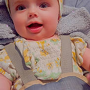 Ata joined the competition — help win amazing prizes! baby, child, smiling, headband, car_seat, straps, blanket, clothing, happy, face, infant, cute, indoors, portrait, toddler, hand, comfort, seatbelt, soft, expression