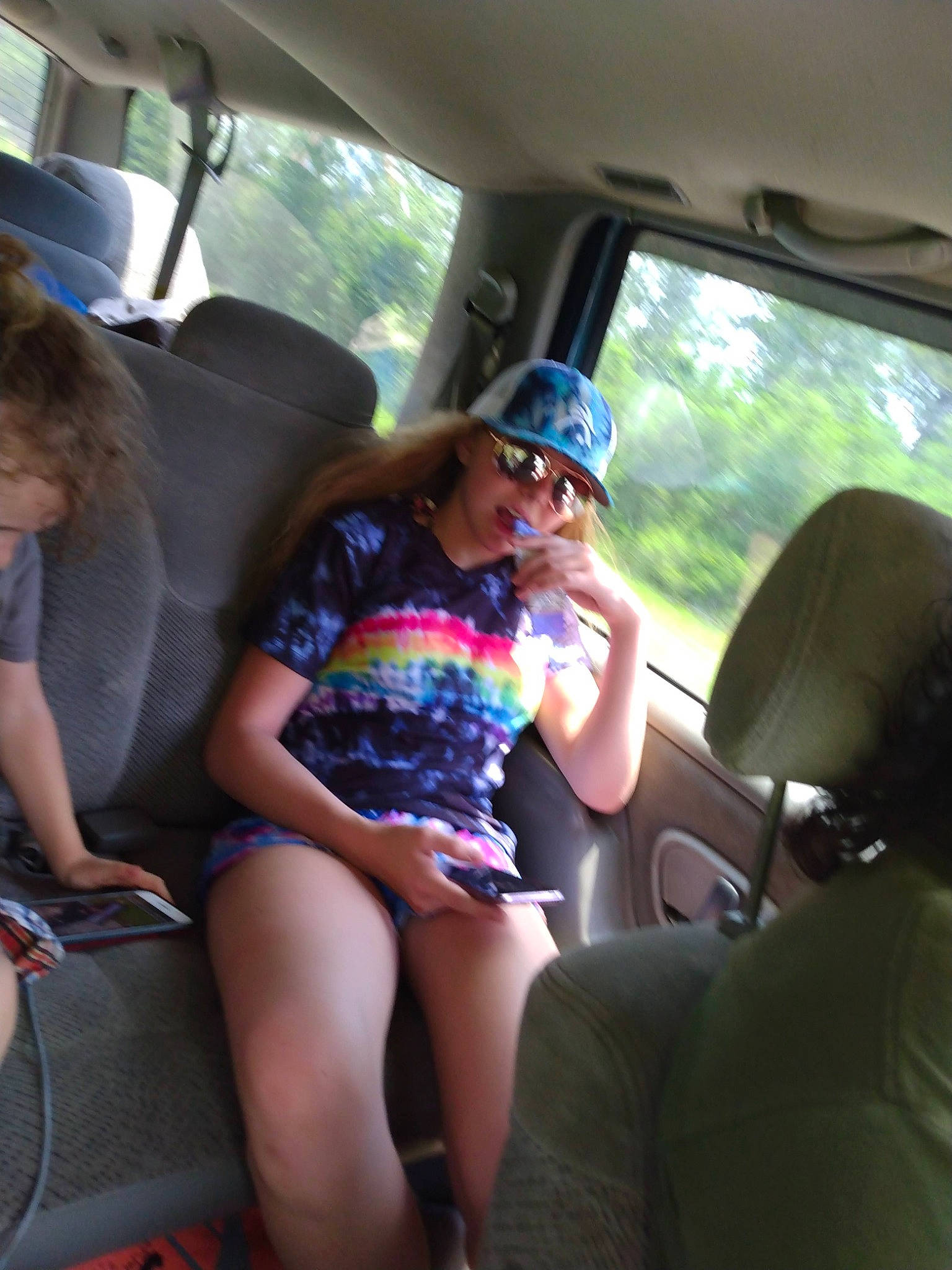 Halie joined the competition — help win amazing prizes! automotive_exterior, car, car_seat, car_seat_cover, comfort, eyewear, fun, goggles, headwear, leisure, mode_of_transport, motor_vehicle, person, shorts, smile, summer, sunglasses, thigh, tree, vehicle