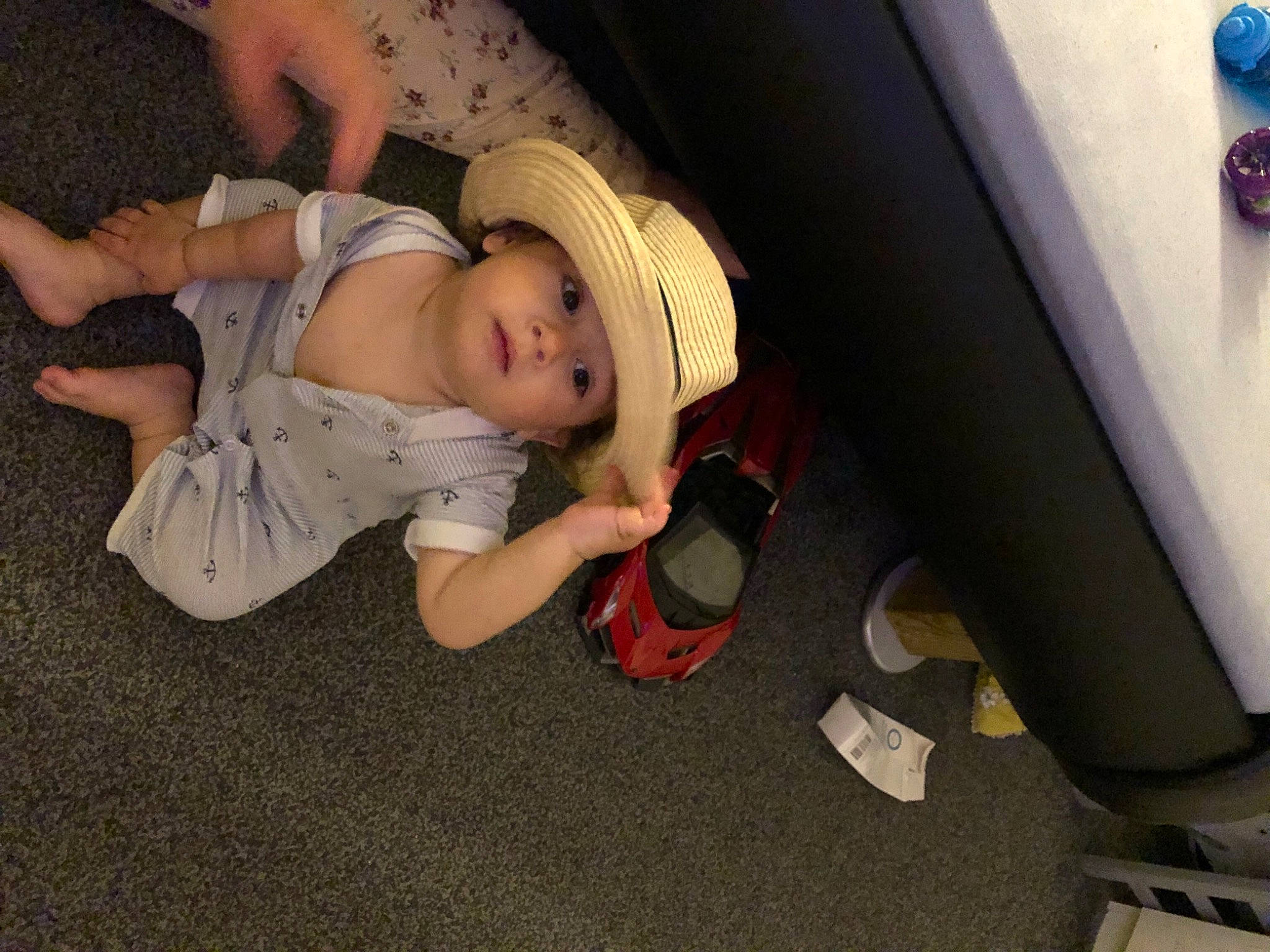 Eduard joined the competition — help win amazing prizes! audio_equipment, baby, baby_toddler_clothing, child, comfort, floor, flooring, fun, hardwood, hat, headwear, human_leg, knee, lap, person, room, sitting, sneakers, sock, thigh