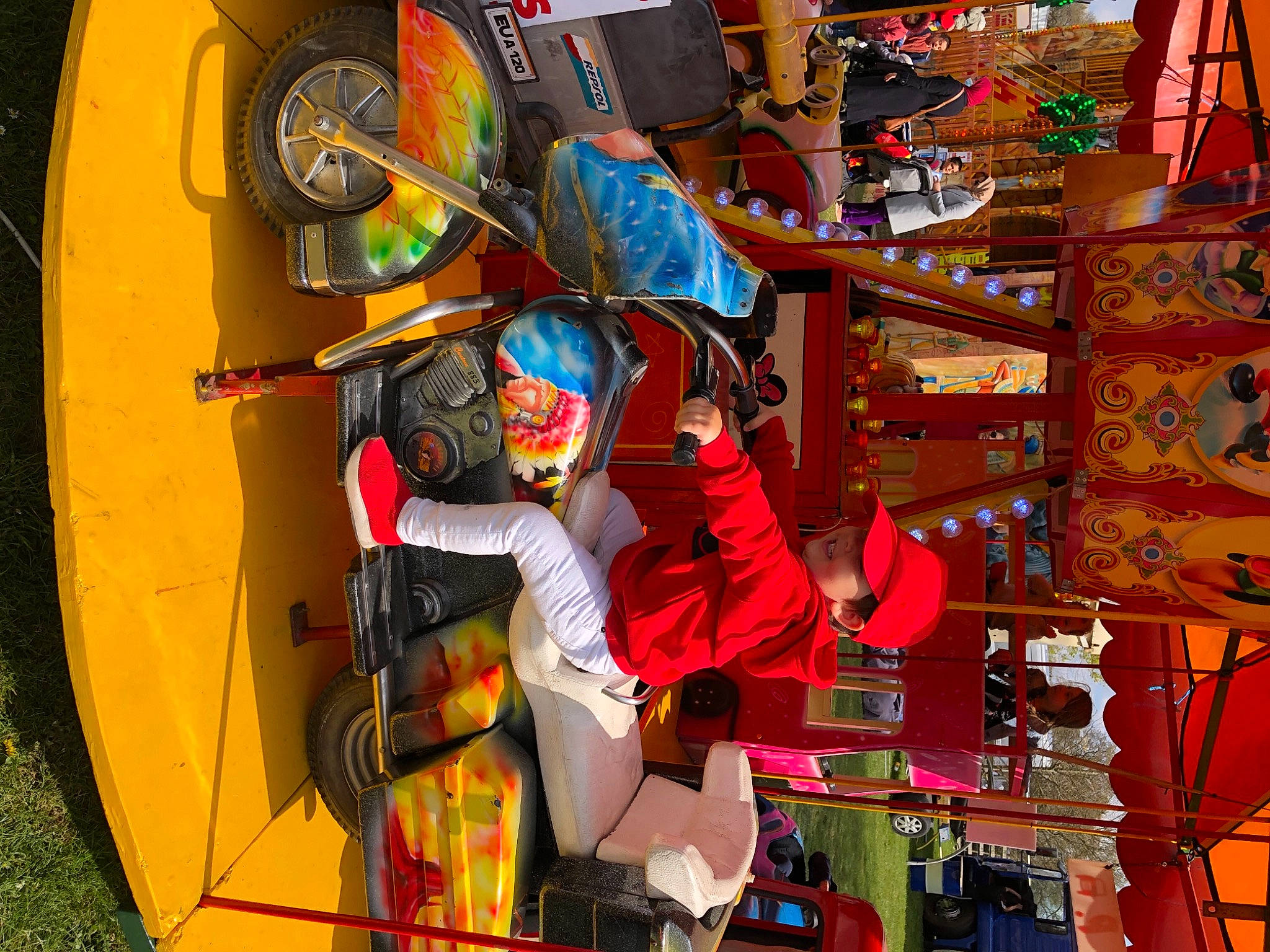 Eric is registered to the contest to win money with this photo: amusement_ride, electrical_supply, engineering, event, fictional_character, fun, headwear, leisure, machine, person, plastic, recreation, room, space, under_exposed, world