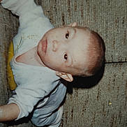 Audrey a rejoint le concours — aidez-le/la à gagner de superbes lots ! baby, bodypart, clothing, couch, crawling, diaper, face, finger, footwear, furniture, hand, head, mouth, newborn, pants, person, photography, portrait, shoe, undershirt