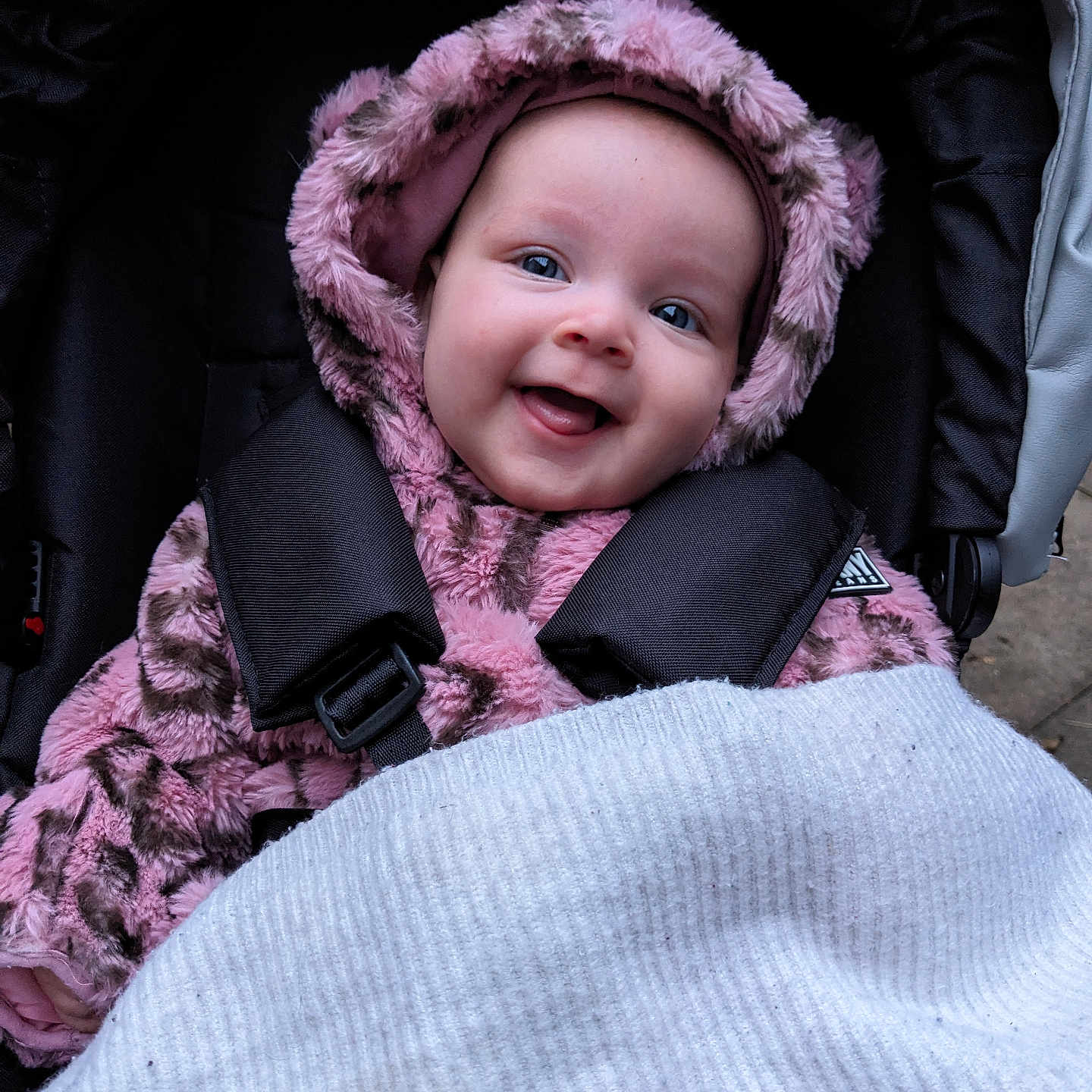 Arwen joined the competition — help win amazing prizes! baby, bonnet, cap, car, clothing, coat, face, hat, head, hood, hoodie, jacket, knitwear, person, photography, portrait, sweater, sweatshirt, transportation, vehicle