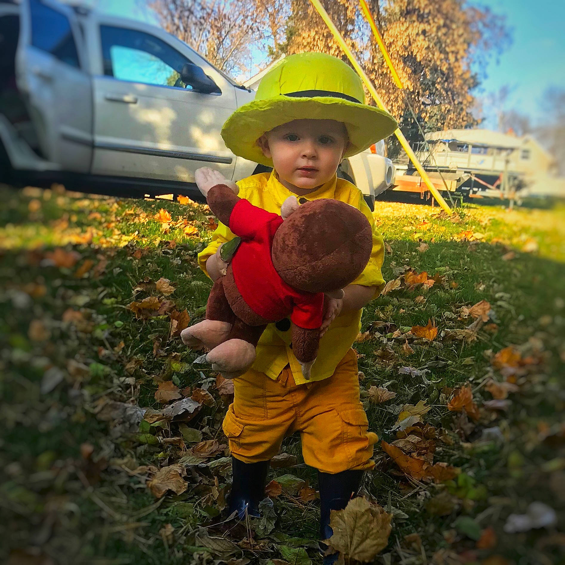 Watson joined the competition — help win amazing prizes! autumn, child, costume, headwear, leaf, outerwear, person, plant, smile, toddler, tree, yellow