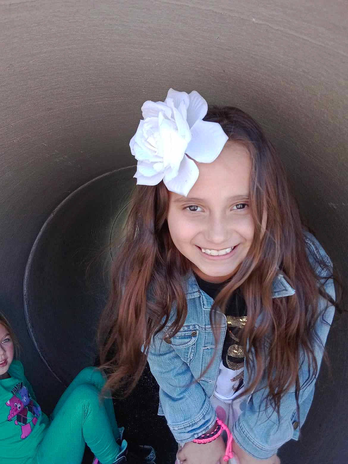 Rose joined the competition — help win amazing prizes! beauty, black_hair, cool, costume_hat, electric_blue, face, flash_photography, fun, hair, happy, hat, headgear, headpiece, headwear, joy, long_hair, person, petal, pink, sleeve