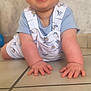 baby, child, crawling, smiling, happy, floor, tile, clothing, overalls, blue_shirt, indoor, person, cute, infant, hands, face, skin, young, playful, joyful