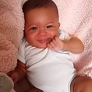Demani joined the competition — help win amazing prizes! baby, cheek, chin, comfort, eye, eyebrow, eyelash, facial_expression, human_body, lip, mouth, muscle, neck, nose, organ, skin, smile, stomach, textile, white