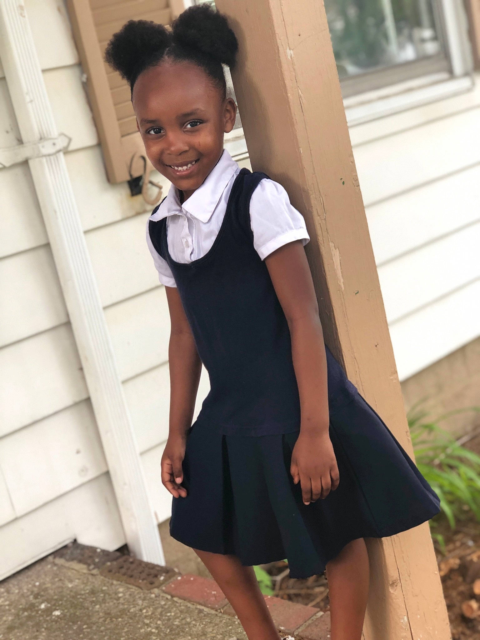 Kailia is registered to the contest to win money with this photo: abdomen, clothing, dress, girl, joy, little_black_dress, person, school_uniform, shoe, shoulder, sleeve, trunk, uniform