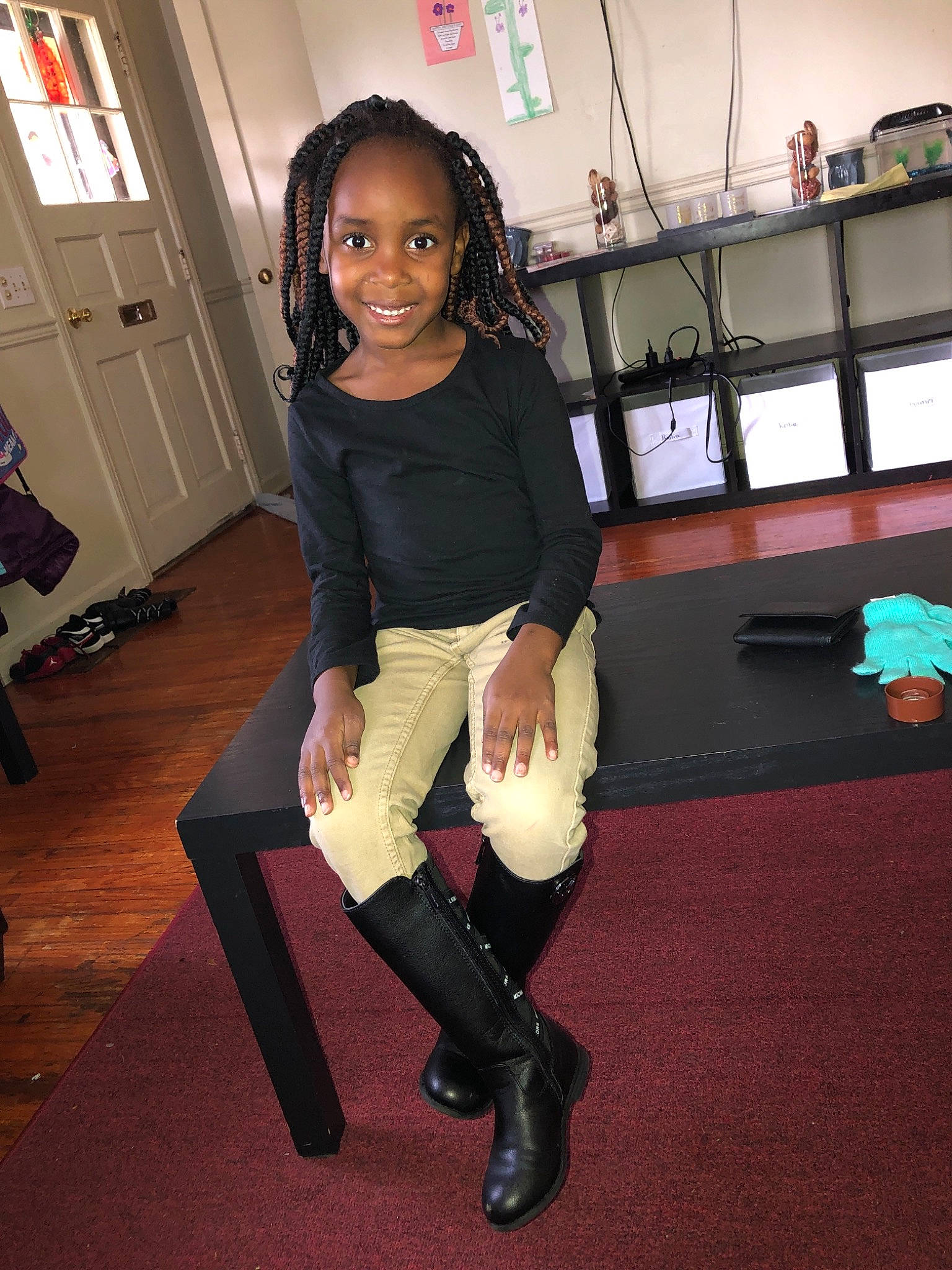 Kailia is registered to the contest to win money with this photo: arm, beauty, carpet, child, fashion, fashion_accessory, flooring, footwear, fun, girl, human_body, joint, joy, leg, material, person, shoe, shoulder, sitting, smile